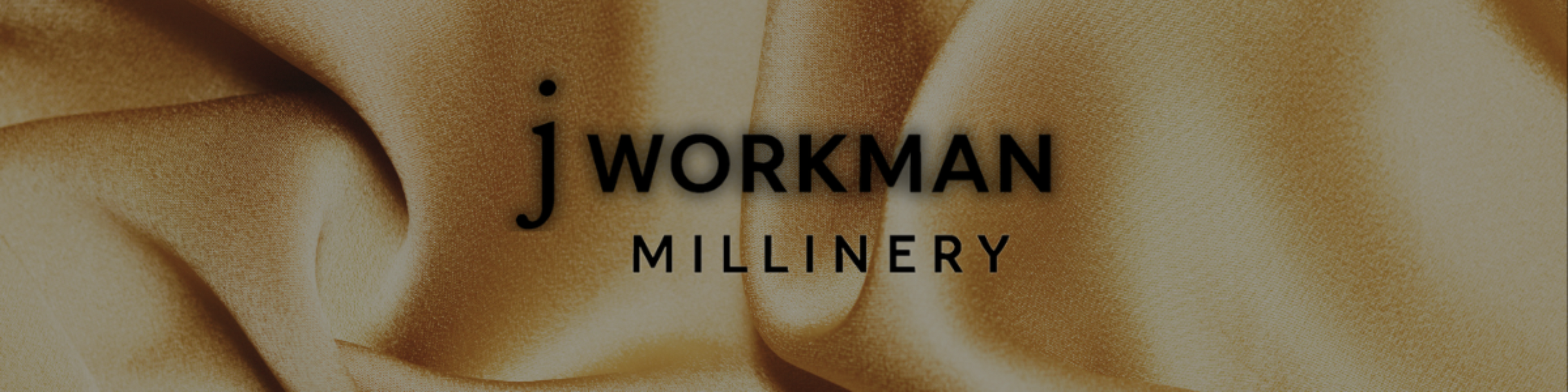 j Workman Millinery logo on a beige fabric background